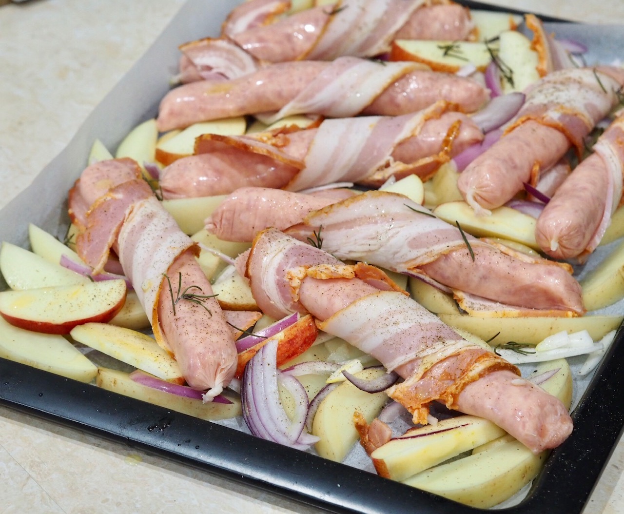 Tray Bake: Bacon Wrapped Sausages