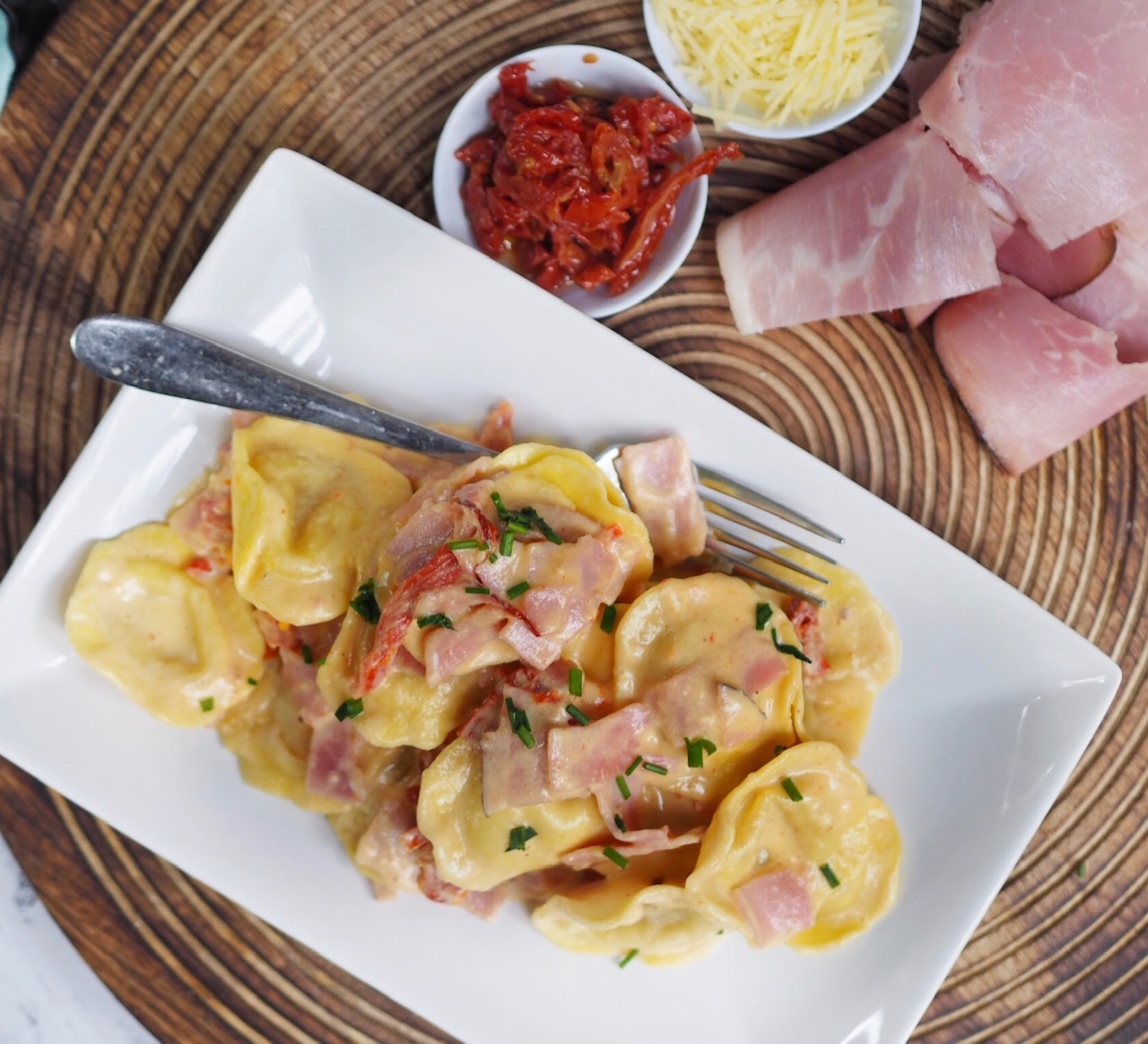 10 Minute Creamy Cheese Ravioli with Ham and Sun Dried Tomatoes