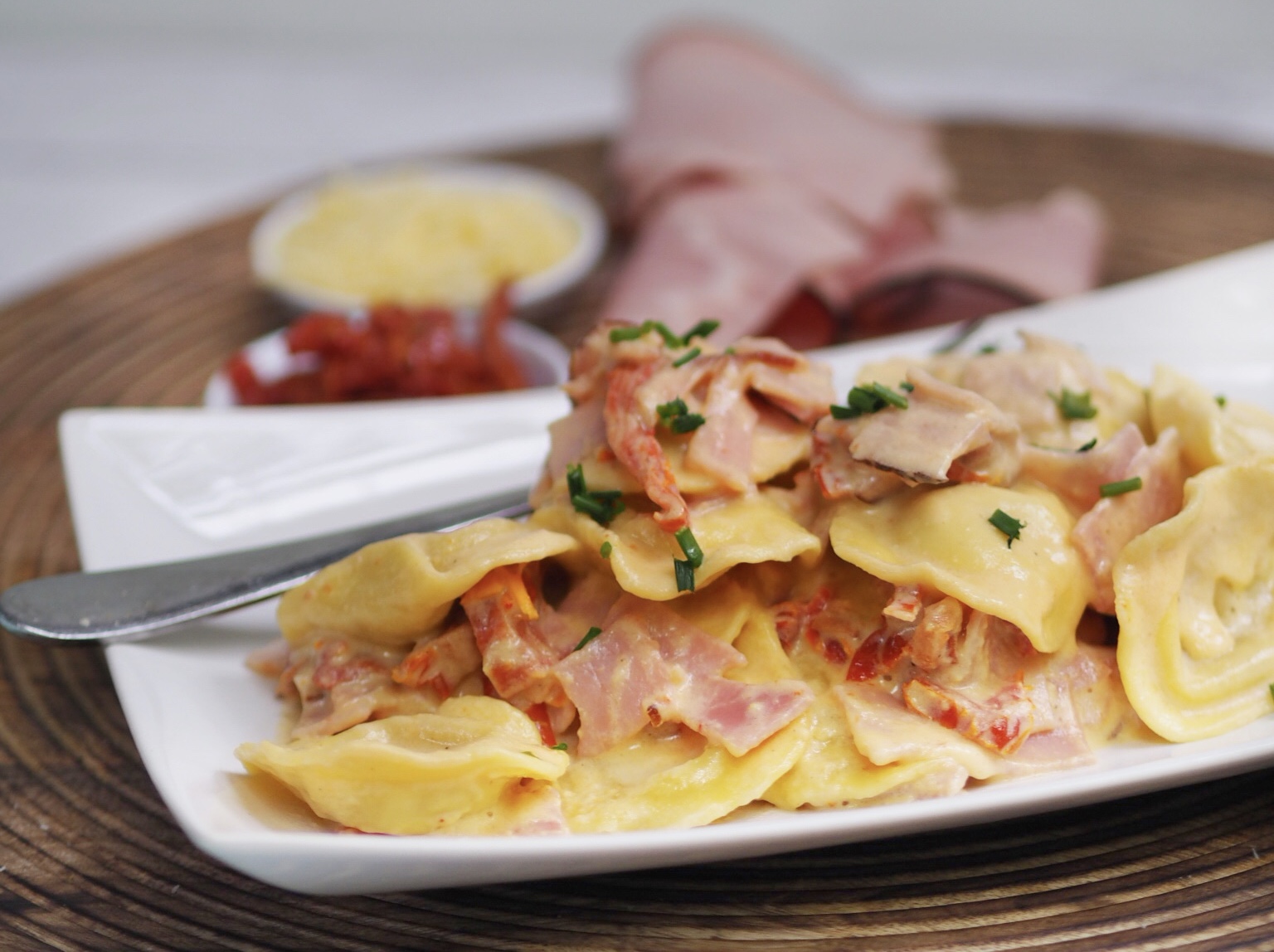 10 Minute Creamy Cheese Ravioli with Ham and Sun Dried Tomatoes